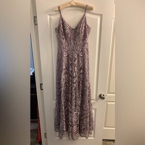 Xtraordinary sleeveless v-neck embroidered mesh overlay a-line long dress.